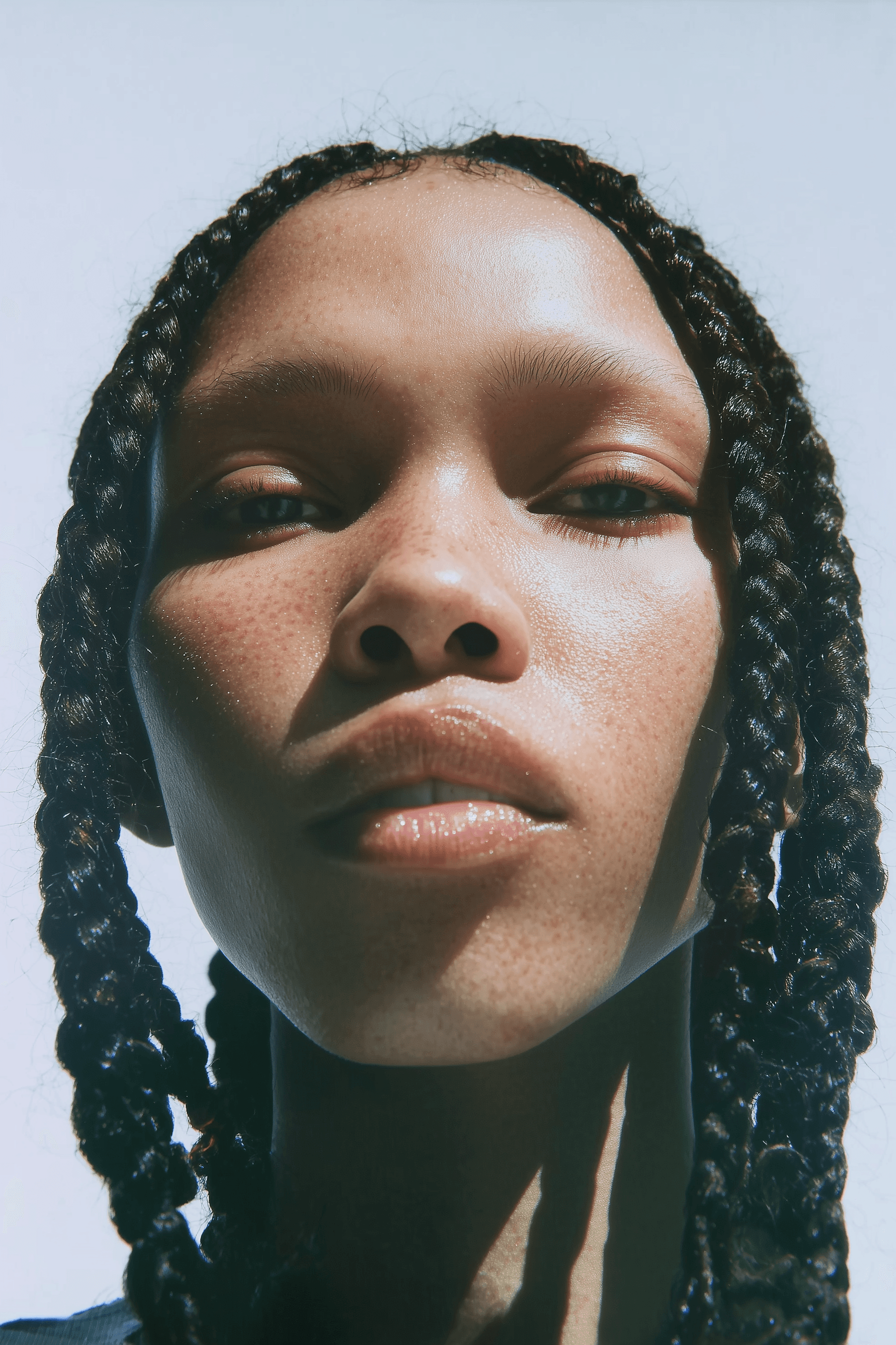 Photorealistic portrait of a Black woman with braided hair